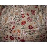 A pair of lined and interlined machine embroidered gold curtains, decorated throughout with flowers,