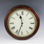 A stained pine eight day wall clock, with Roman numeral dial,