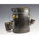 A 19th century iron and brass milk churn, with brass makers badge for Dairy Outfit Co Ltd, makers,