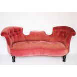 A Victorian double back chaise longue, pink upholstered, on turnd ebonised legs with castors, 167.