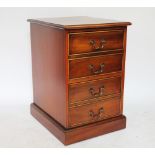 A mahogany two drawer filing chest, on plinth base,