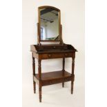 An Edwardian stained beech wash stand, with drawer and under tier, on tapered legs,