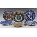 A large selection of English and Scottish pottery transfer printed plates, including Cochran, Adams,