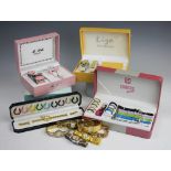 A collection of assorted cased watch and jewellery sets, to include; Qbos Secret, Qbos Ladies,