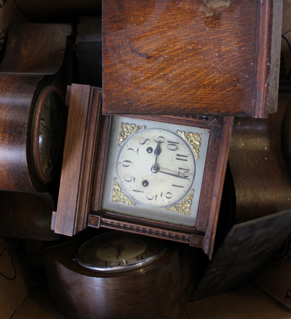 A collection of early 20th century mantel clocks and part clocks,