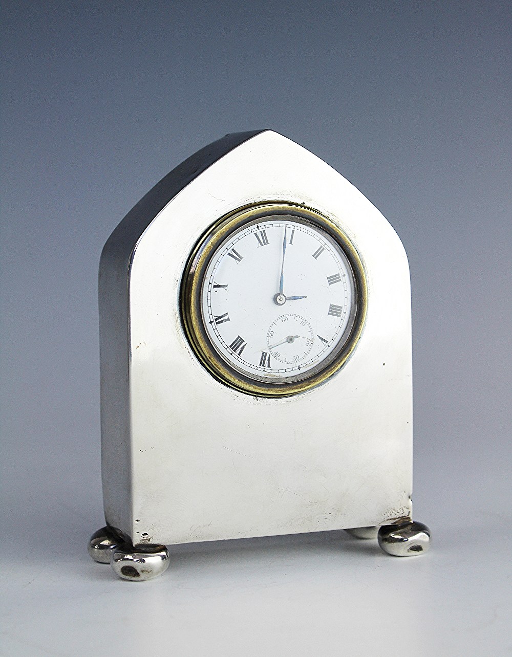 A George V silver cased lancet shaped bedside timepiece, Charles S Green & Co Ltd, Birmingham 1919, - Image 2 of 10