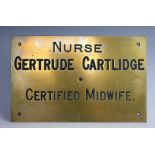 A brass door plate/name plaque to 'Nurse Gertrude Cartlidge,