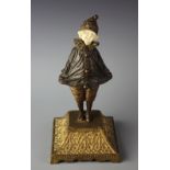 Demétre Haralamb Chiparus - An Art Deco bronze and ivory figure of a girl 'Little Clown' on