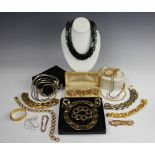 A collection of assorted costume jewellery, to include; assorted lockets and chains,