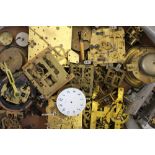 A large collection of clock movements,