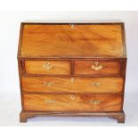 A George III inlaid mahogany bureau, with fall front enclosing a fitted interior,