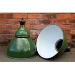 A pair of vintage green enamel industrial ceiling lights,