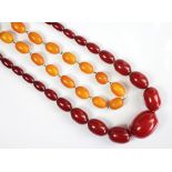 A vintage cherry amber graduated bead necklace (largest 3cm wide, smallest 1cm wide) weight 66.