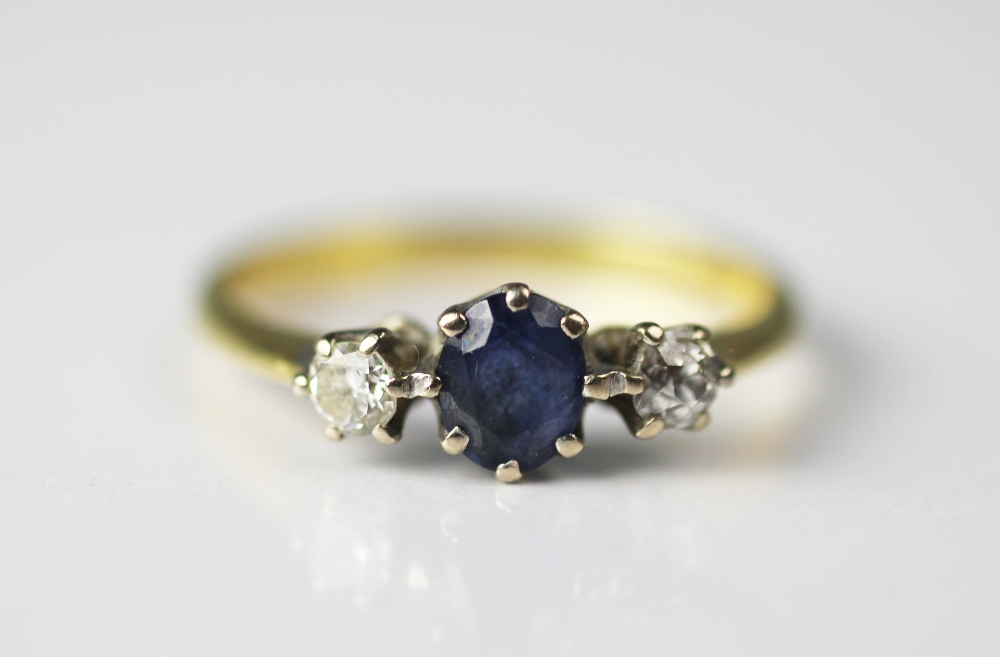 A diamond and sapphire three stone ring, set in 18ct yellow and white gold, - Image 2 of 3
