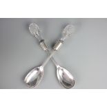 A pair of George V silver salad servers, Birmingham 1928, with cut glass handles,