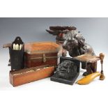 A Black Forest carved wood wall bracket, modelled with an eagle, a 29cm, a pair of book ends,