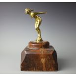 An Art Deco brass car mascot, modelled as a nude female, stamped 'REG ED AEL', 17cm,