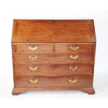 A George III mahogany bureau, with fall over two short and three long drawers, on ogee bracket feet,