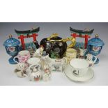 A collection of ceramics, to include; a pair of Sevres style vases and covers, 14cm,