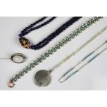 A collection of jewellery, to include; an Art Deco circular locket and attached chain,