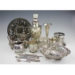 A selection of silver to include; a pierced bon bon dish,