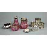 A late Victorian silver plate mounted three piece condiment set,