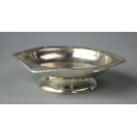 A small silver dish, William Suckling Birmingham 1941, of hexagonal form and with low pedestal base,