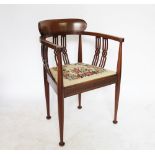 An Edwardian inlaid mahogany tub chair, with tapestry seat,