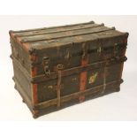 An Emergency Trunk and Bag Co steamer trunk, wood and metal bound with canvas covering,