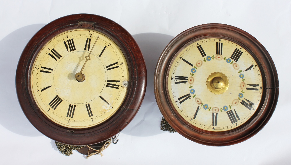 Two late 19th century postman type all clocks, each with a painted Roman numeral dial,