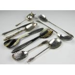 A selection of silver comprising; a large Victorian silver and gilt apostle spoon, Henry Holland,