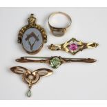 An opal and seed pearl set brooch circa 1915, of stylised 'winged form' and suspending opal drop,
