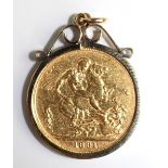 A Victorian gold sovereign dated 1891, within a 9ct gold scroll mount, gross weight 9.