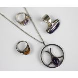 A collection of Modernist jewellery, to include; a Finnish silver and amethyst cabochon set ring,