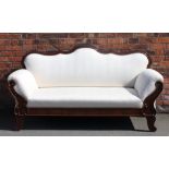 A 19th century Biedermeier style mahogany scroll end settee, with ivory chevron upholstery,