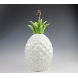 A Portuguese faience table lamp, modelled as a pineapple, 49cm high.