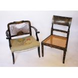 A pair of chinoiserie lacquered chairs, with panelled backs and caned seats, 75cm H,