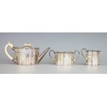 A Victorian silver three piece bachelor tea service, Robert Harper, London 1877,