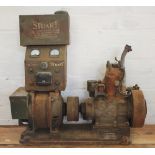 A Stuart Turner 300 watt boat engine, No 33797, with brass makers plate, 70cm,