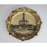 An Austiran Josef strnact relief moulded 'New Brighton on Tower' plate, impressed No.3508, 25.