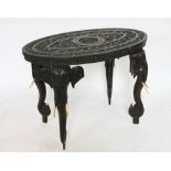 An Anglo-Indian carved hardwood oval occasional table,
