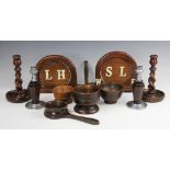 A selection of treen items comprising; a pair of Masonic rotating table stands,