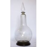 A late 19th century glass chemists apothecary jar and stopper, of large size, with faceted stopper,