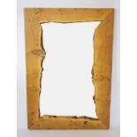 A modern rustic oak framed wall mirror,