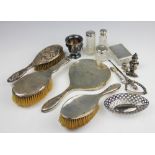 An assortment of silver wares including;