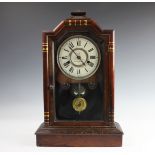 A 19th century rosewood mantle clock, possibly American,