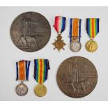 A World War I family medal group and death plaques, comprising trio and plaque to 13188 Pte J. B.