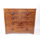 An early 19th century inlaid mahogany chest, of two short and three long drawers,