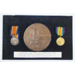 A World War I pair and death plaque to 703062 Cpl E.