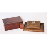 An oak and mahogany cross banded writing slope with compartmented leather interior,